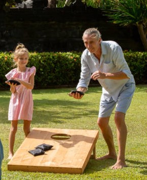people playing cornhole.1